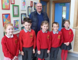 Fr. Crudden brings treats for our P.3 and P.4 pupils